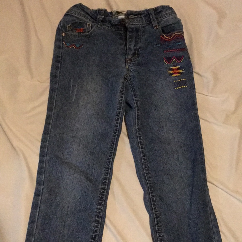 Girls adjustable jeans .
